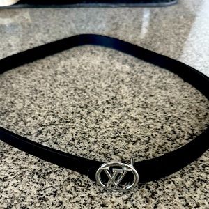 Black Leather Belt. Adjustable strap forts sizes from S-XL.